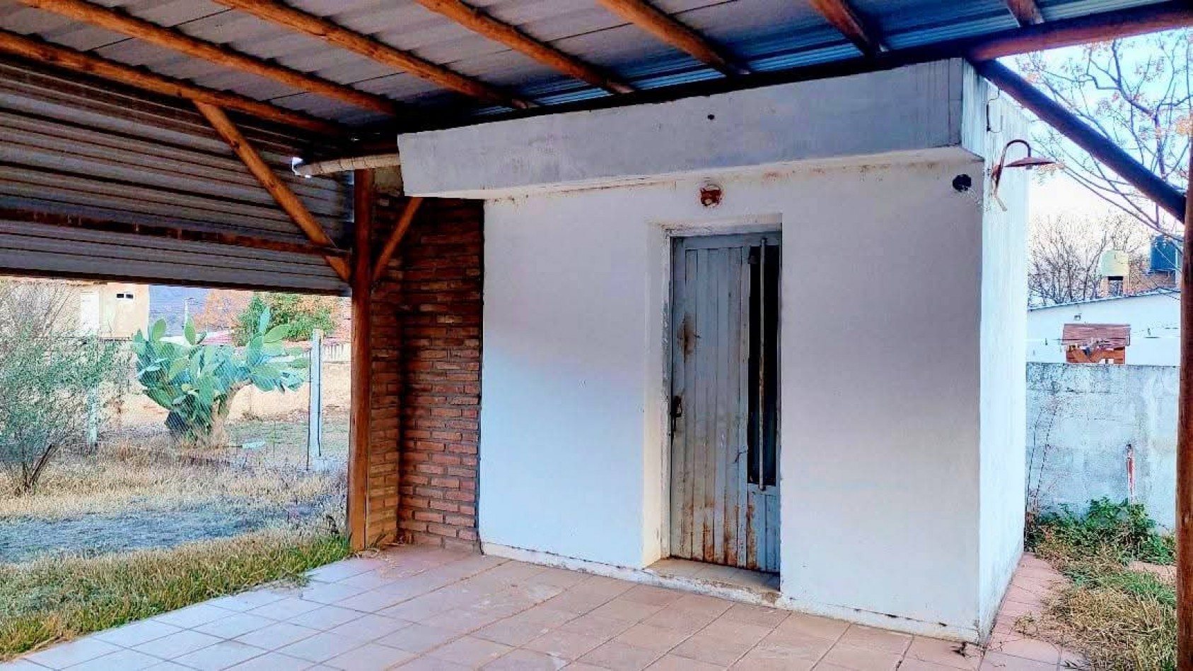 TERRENO CON CONSTRUCCION EN VENTA EN SANTA MARIA DE PUNILLA. TE134
