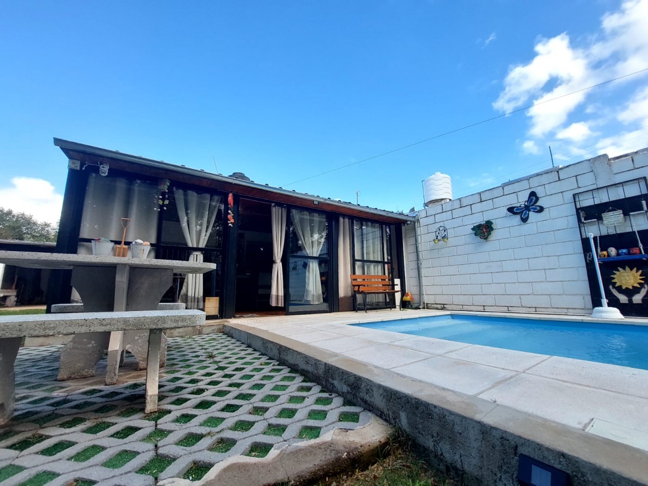 CASA EN VENTA CON SALIDA AL RIO Y PISCINA COMPLETA EN SANTA MARIA DE PUNILLA, ENTORNO SERRANO. CA246